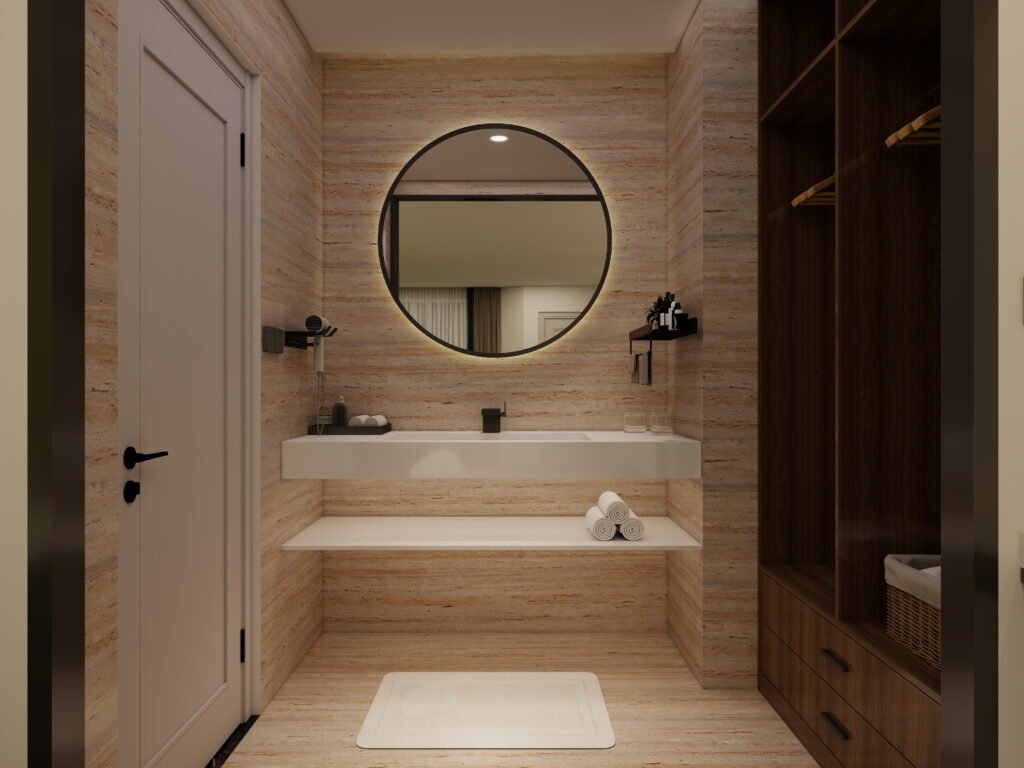 Modern luxury bathroom with large-format beige travertine-look tiles, floating white vanity, round LED mirror, and matte black fixtures